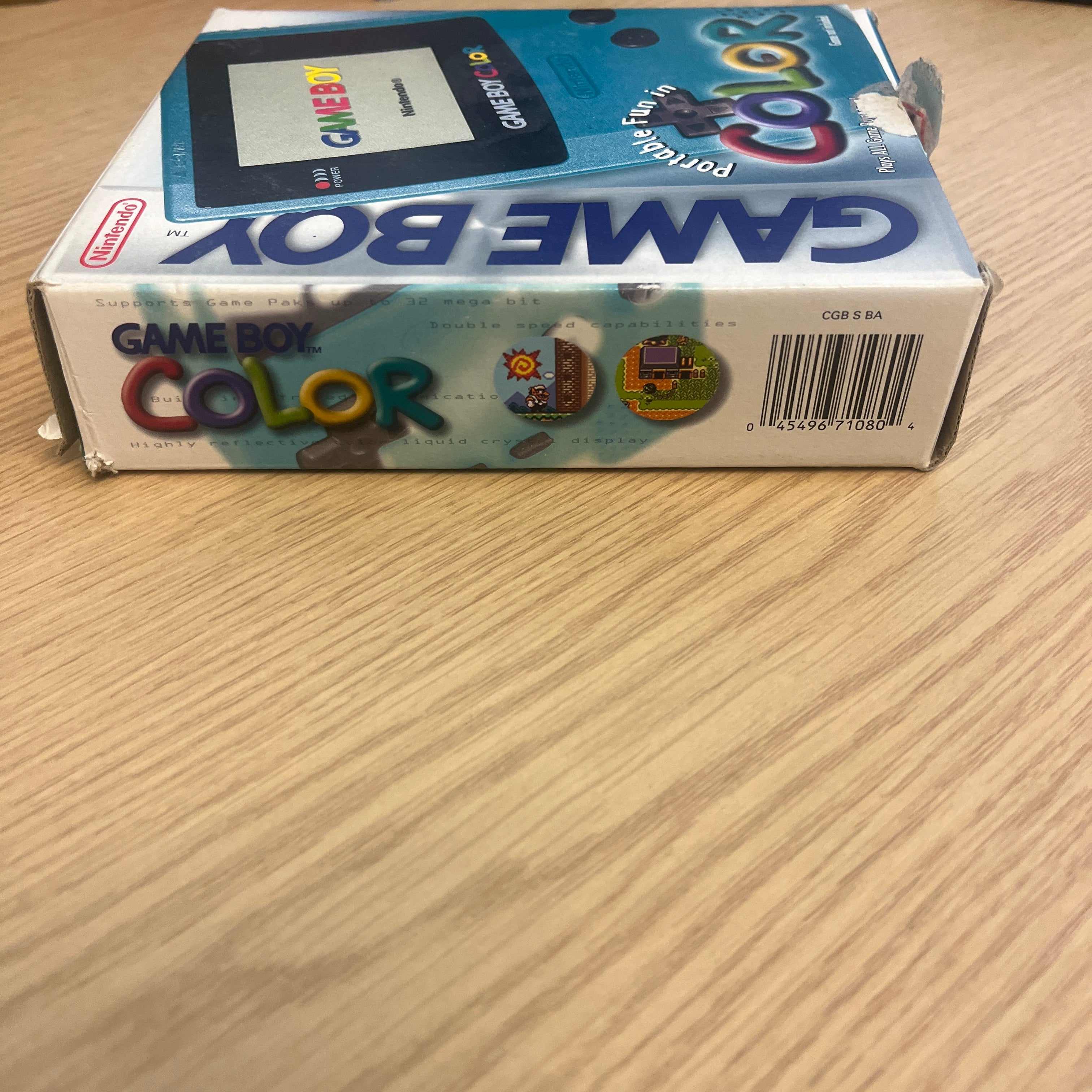 Teal game boy color boxed