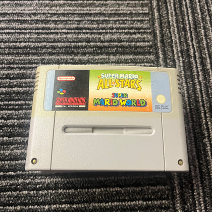 Super Mario All-stars and Super Mario World Snes game cart only