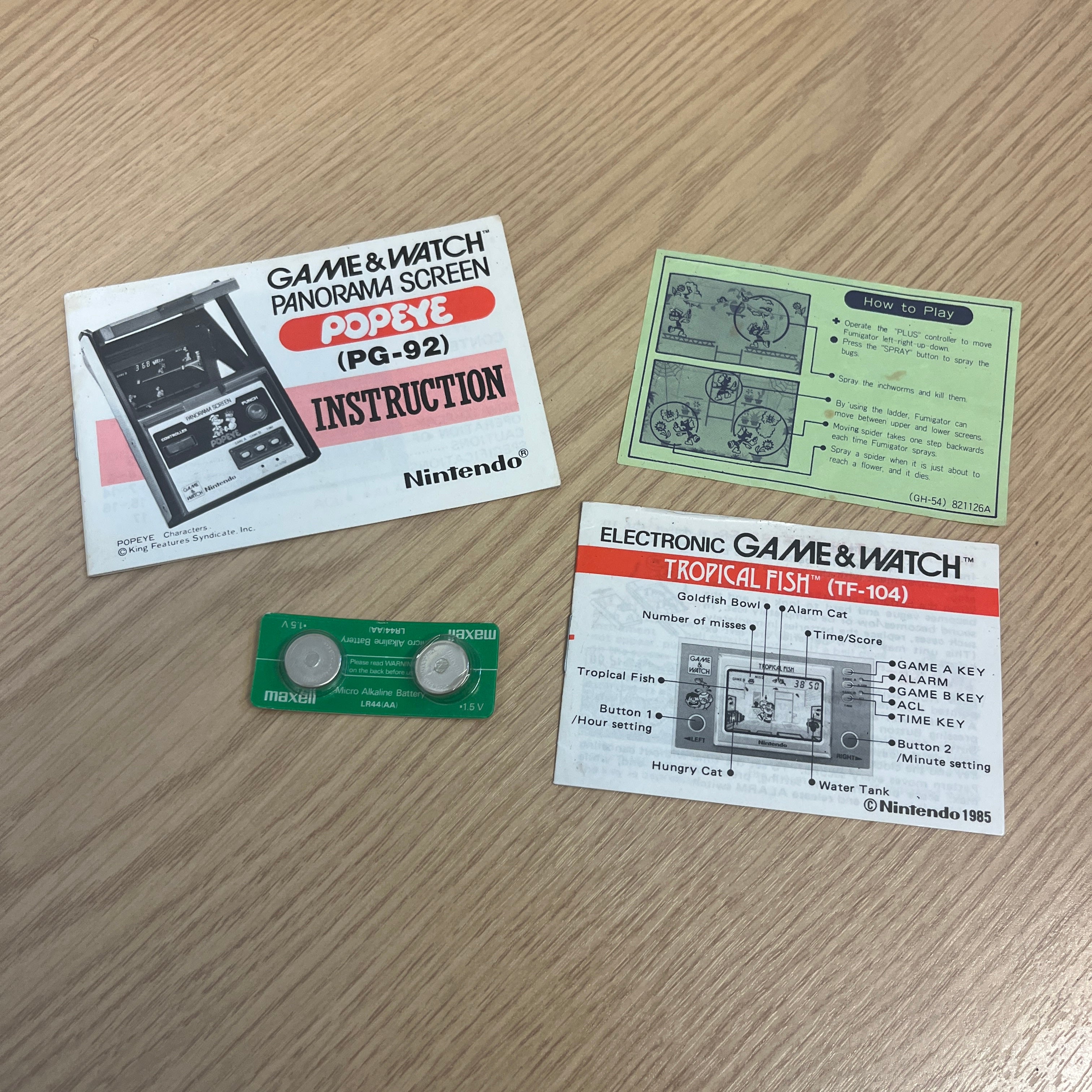 Game watch manuals and batteries