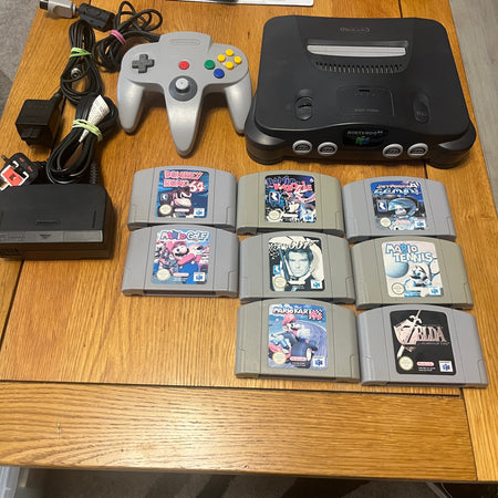 Nintendo n64 console bundle with 8 games