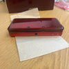 Boxed metallic red Nintendo 3ds console