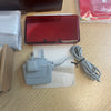 Boxed metallic red Nintendo 3ds console