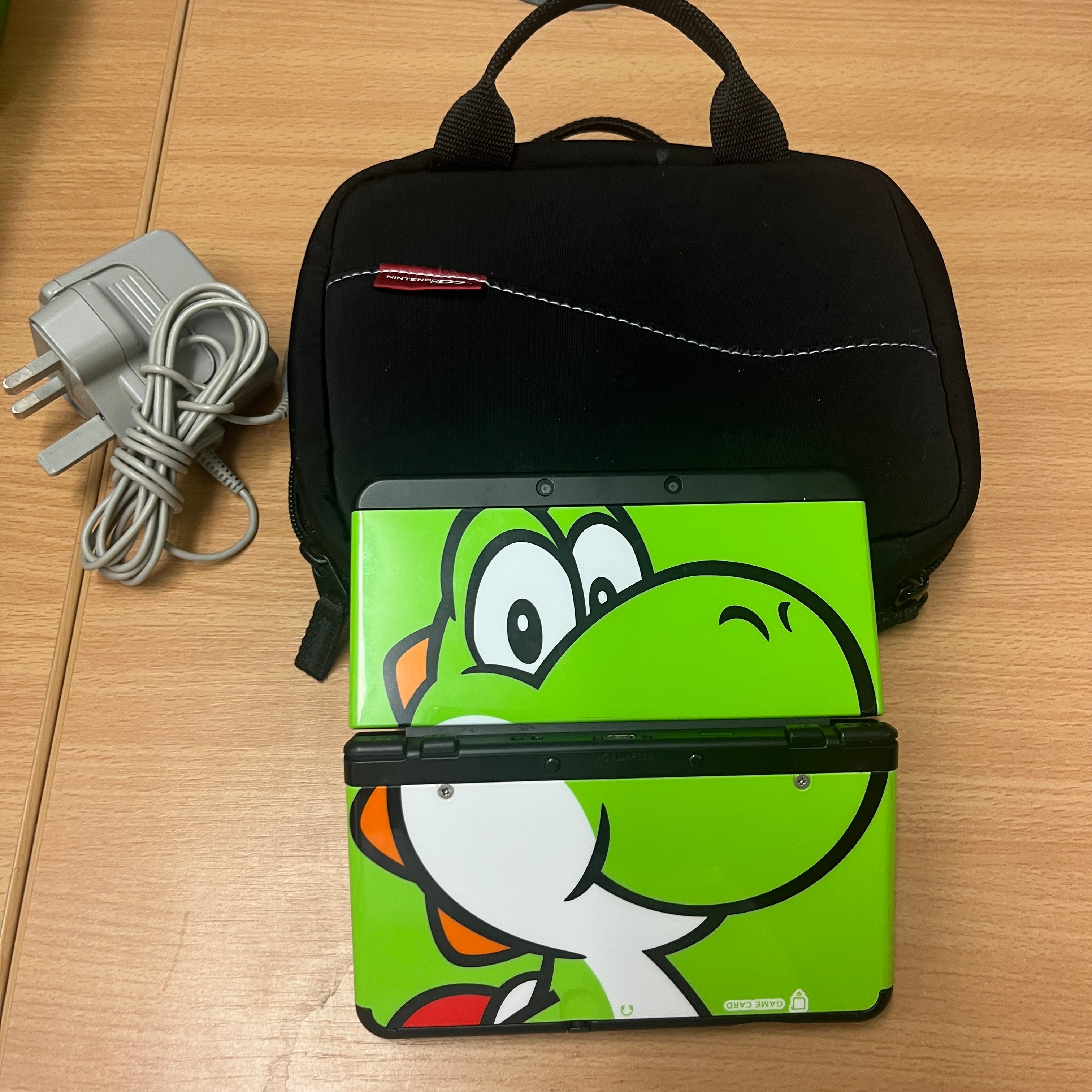 New Nintendo 3ds console with yoshi cover plates Nintendo