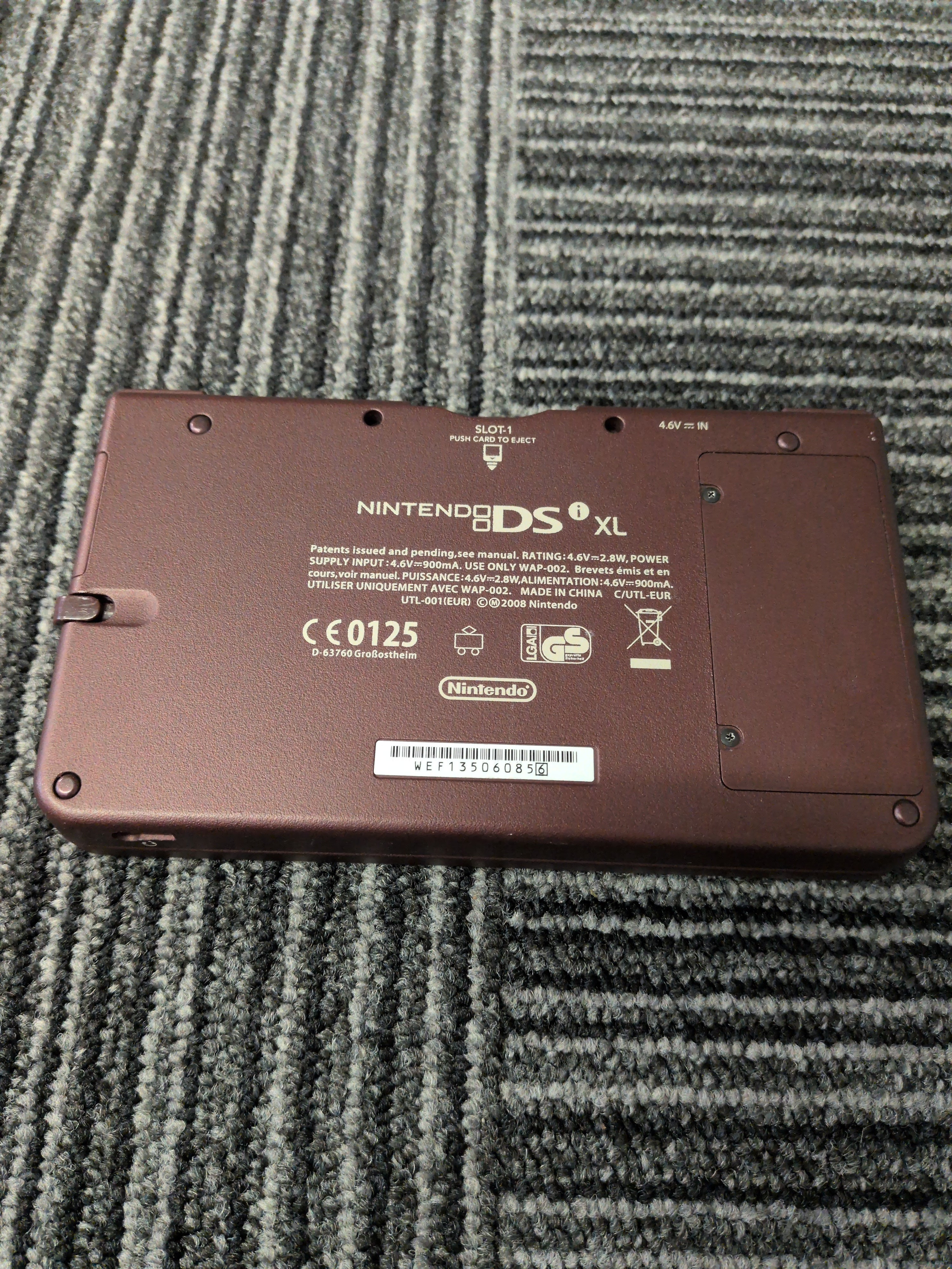 Nintendo DSi XL Handheld Wine Red & Games Bundle