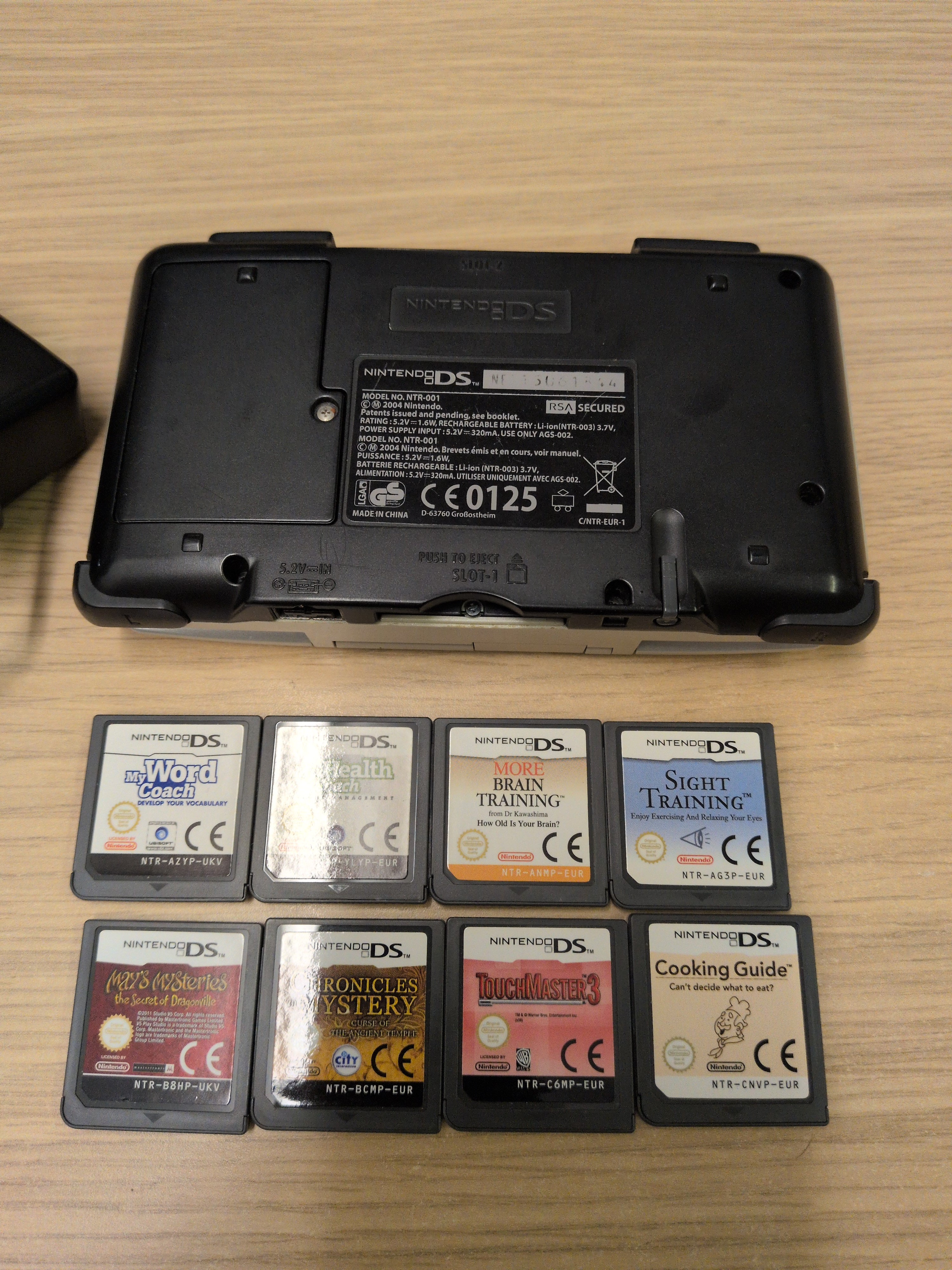 Nintendo DS Original handheld console bundle with 8 games