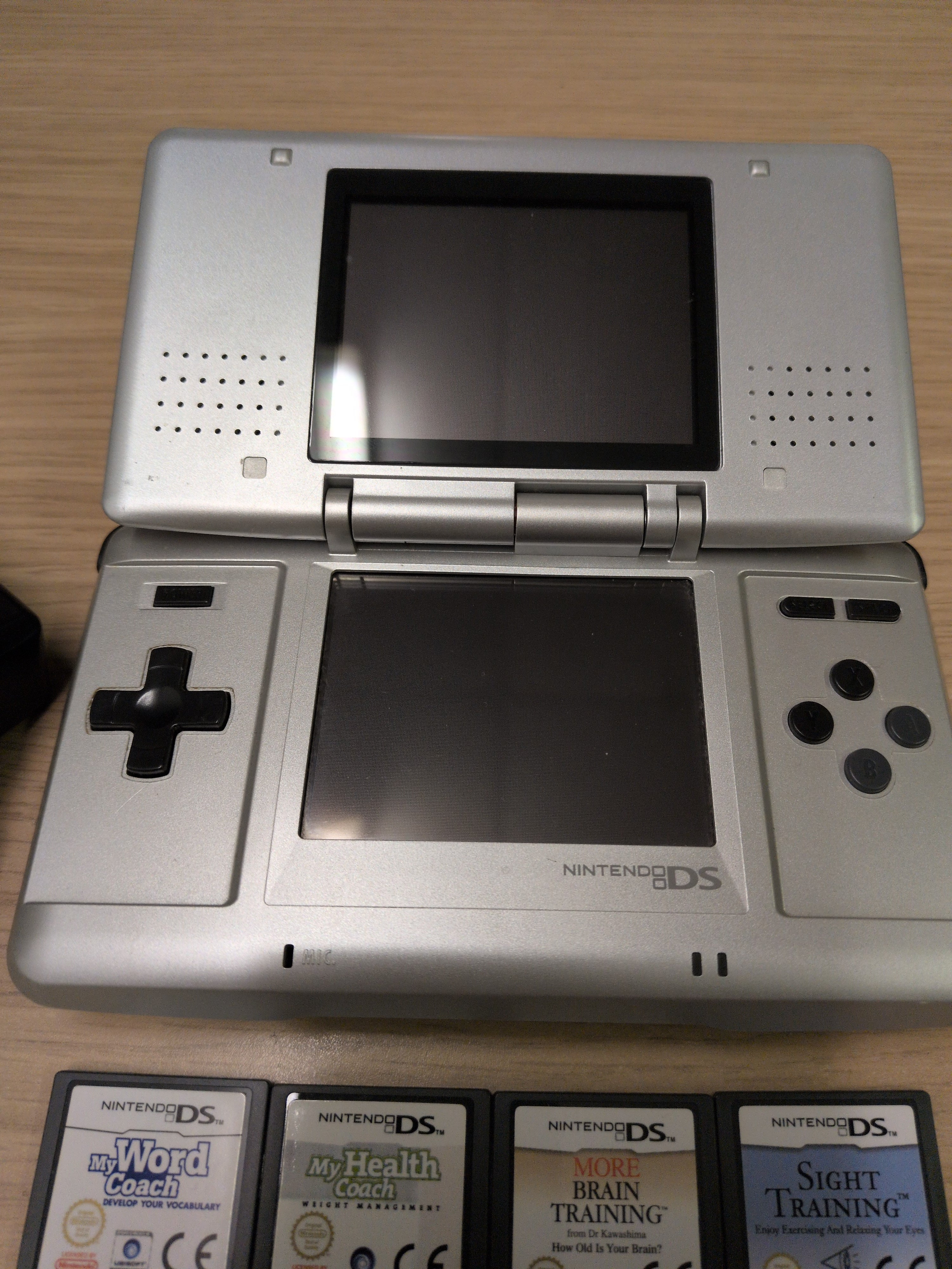 Nintendo DS Original handheld console bundle with 8 games