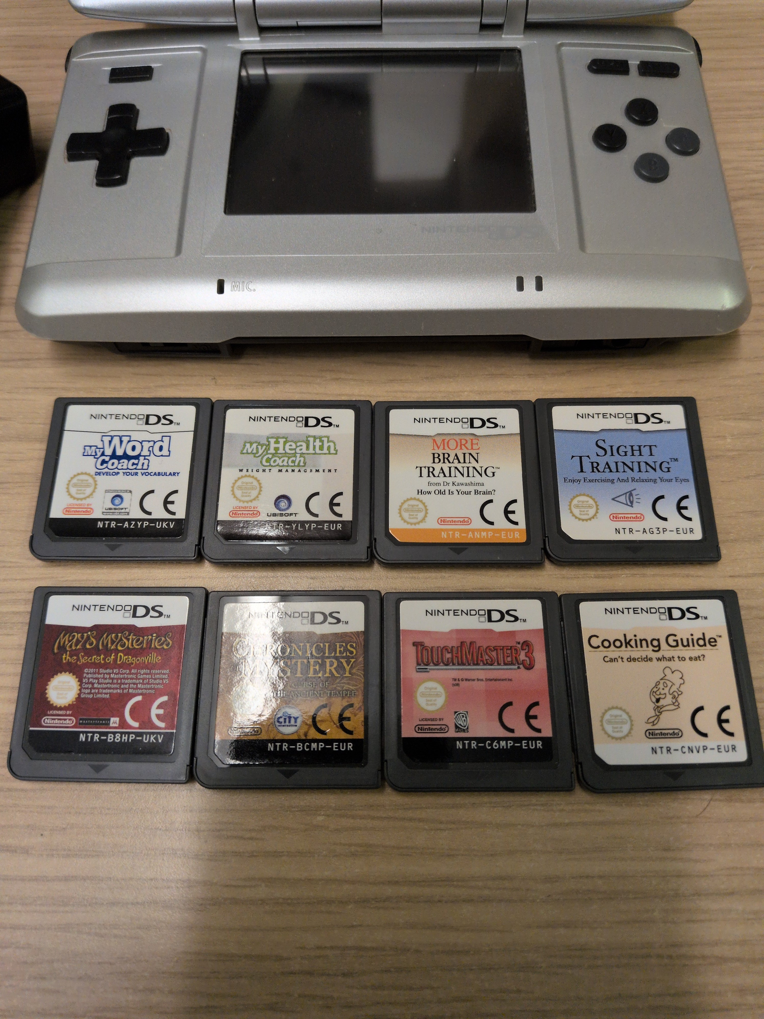 Nintendo DS Original handheld console bundle with 8 games