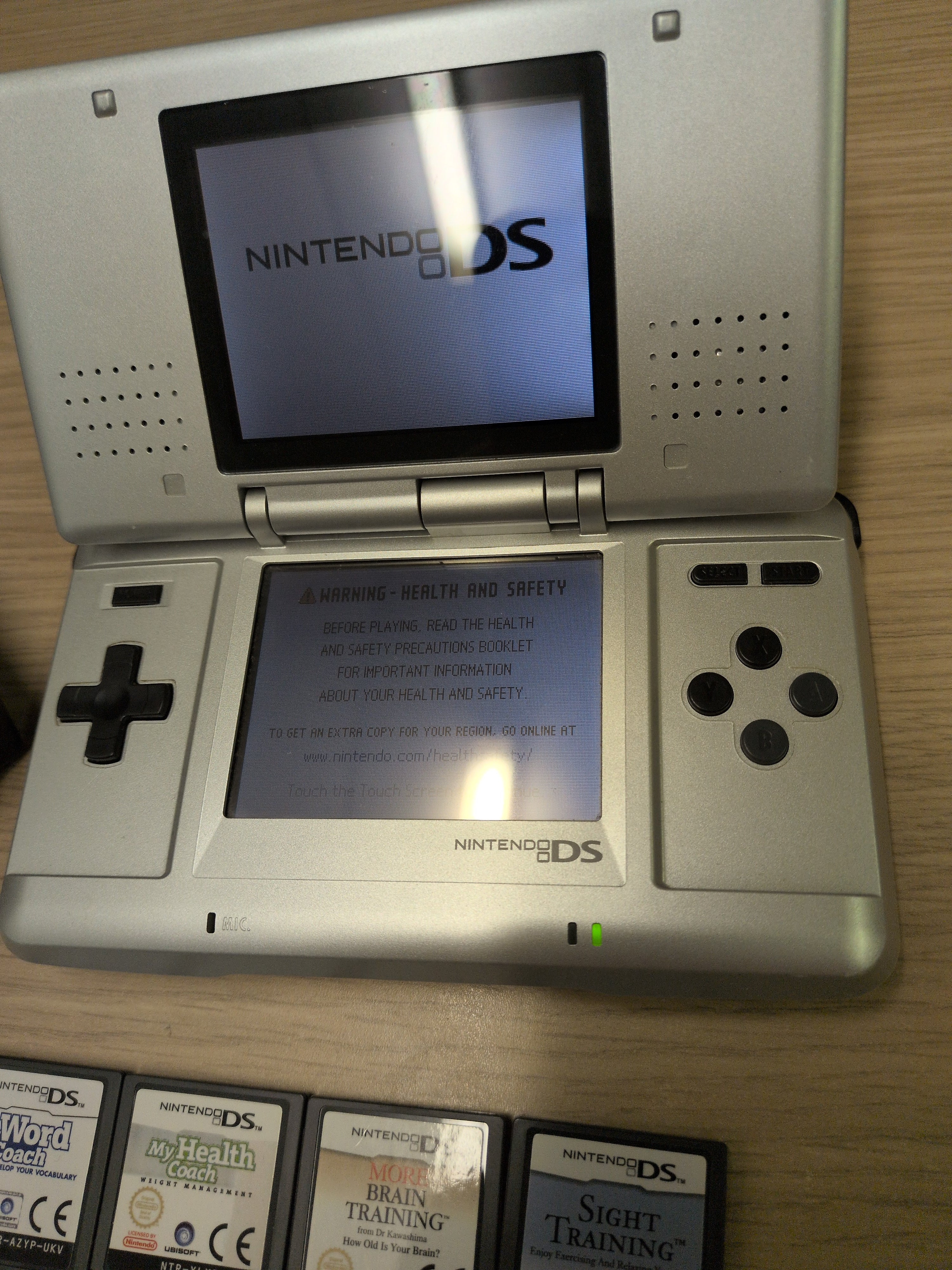 Nintendo DS Original handheld console bundle with 8 games