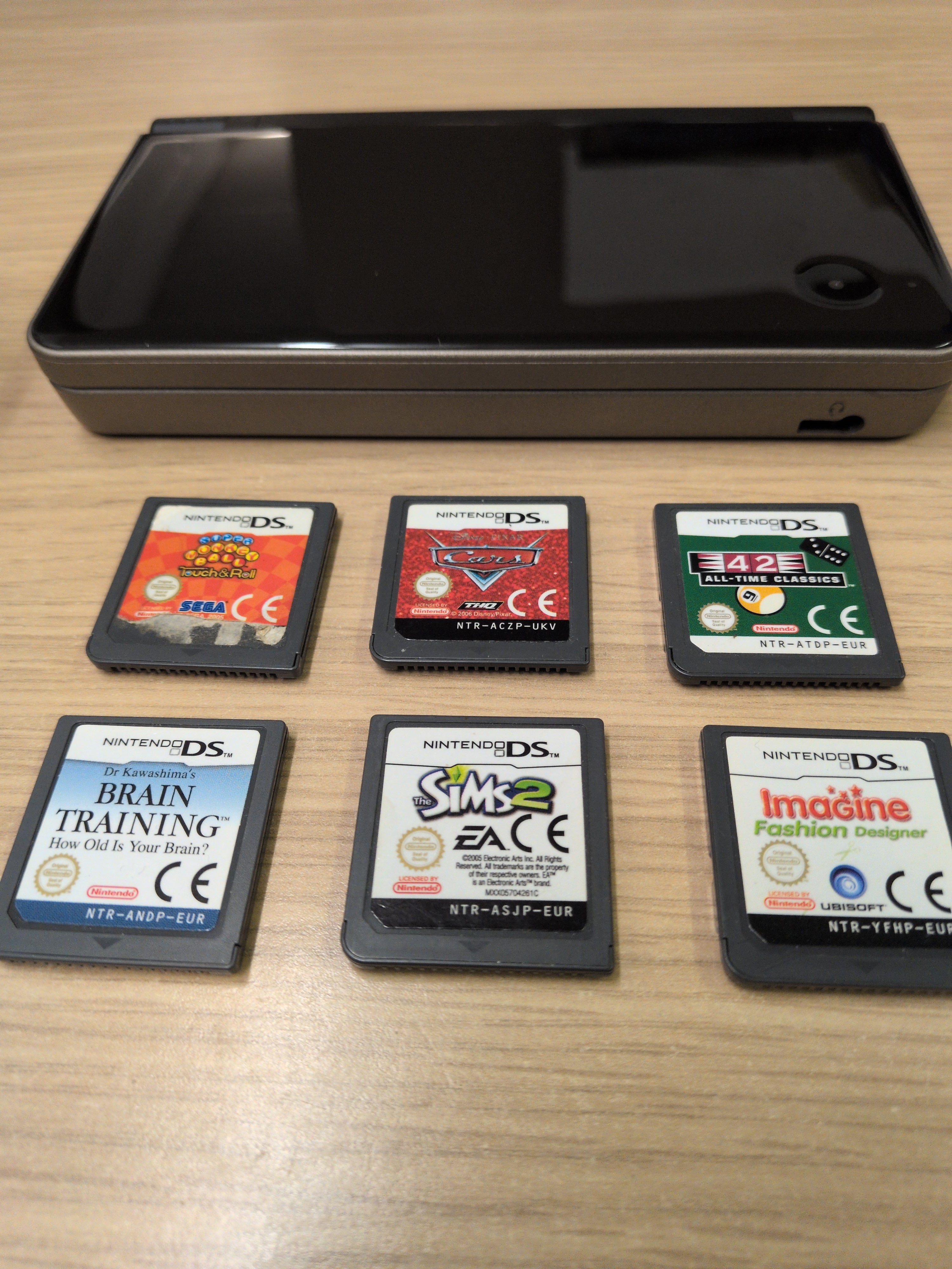 Nintendo DSi XL Handheld Dark Brown & Games Bundle