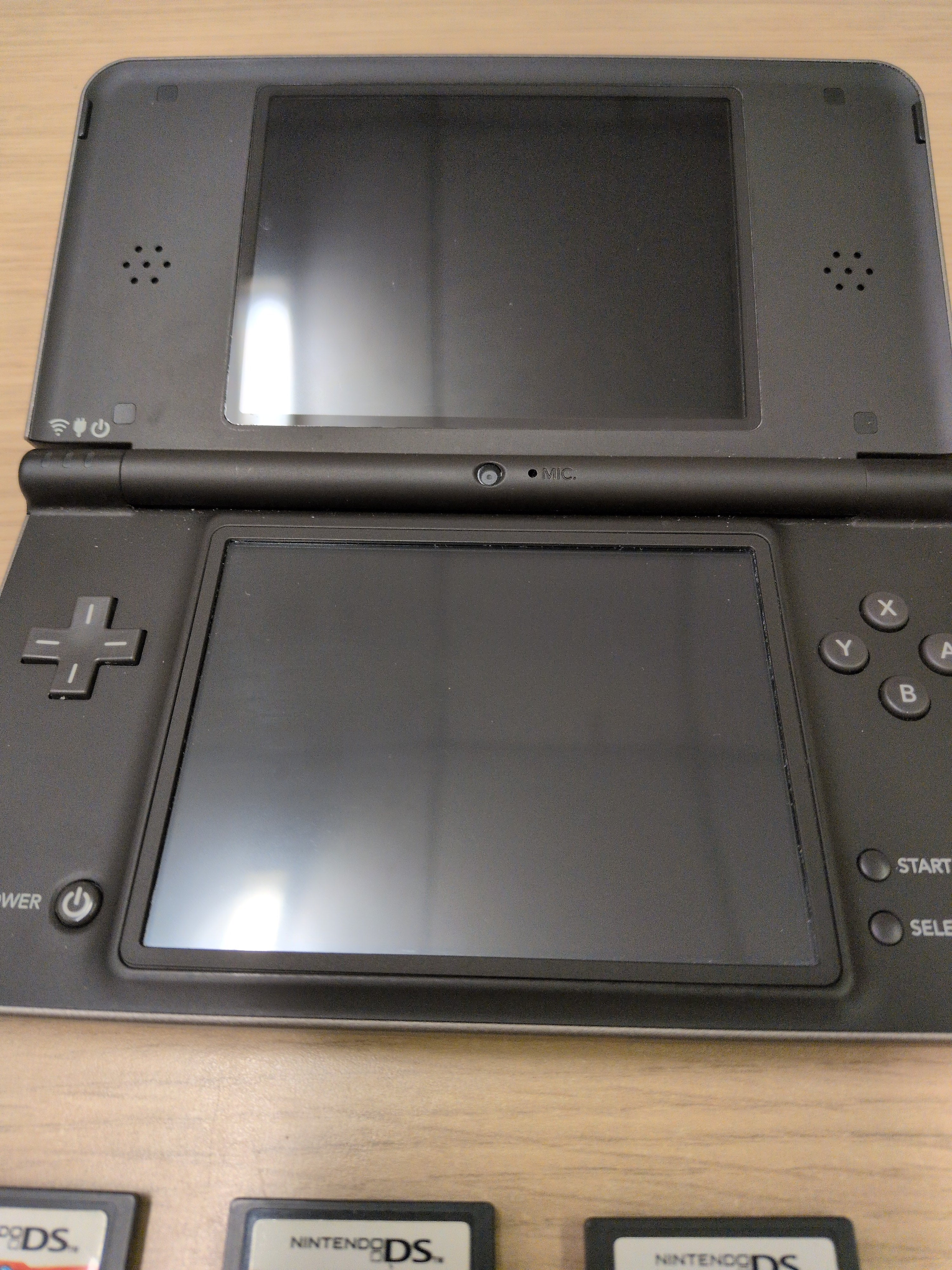 Nintendo DSi XL Handheld Dark Brown & Games Bundle