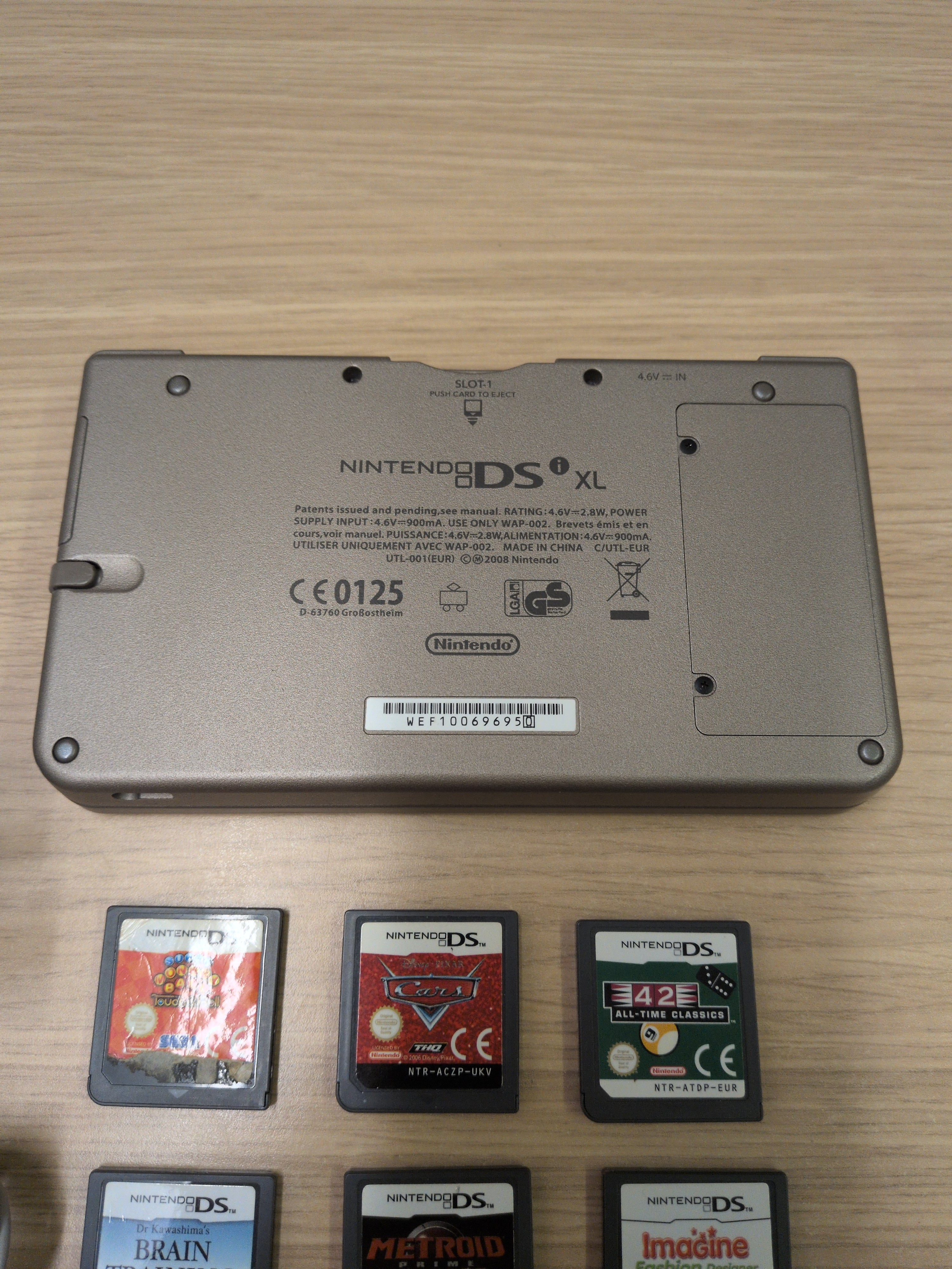 Nintendo DSi XL Handheld Dark Brown & Games Bundle