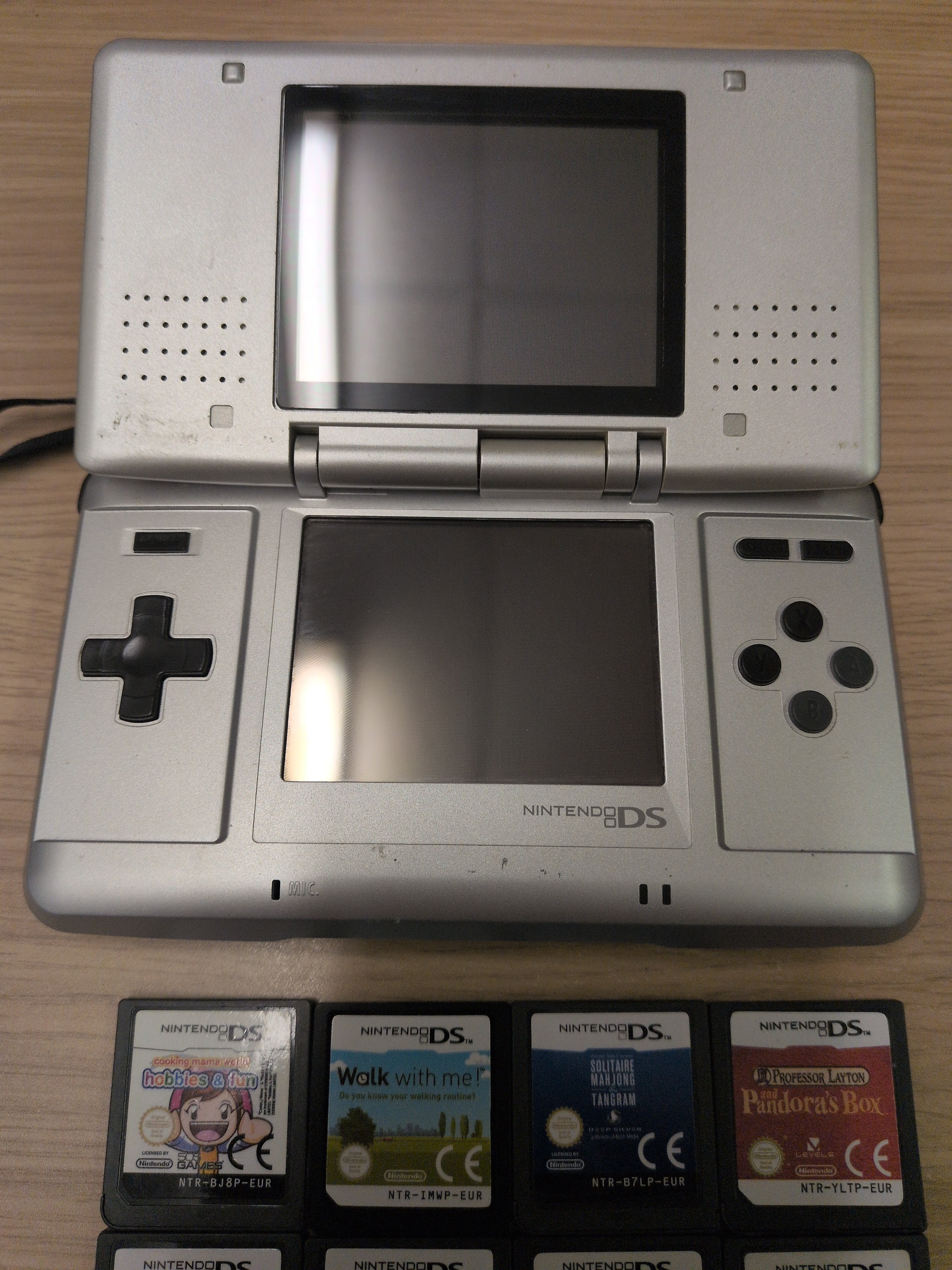 Nintendo DS Original handheld console bundle with 8 games