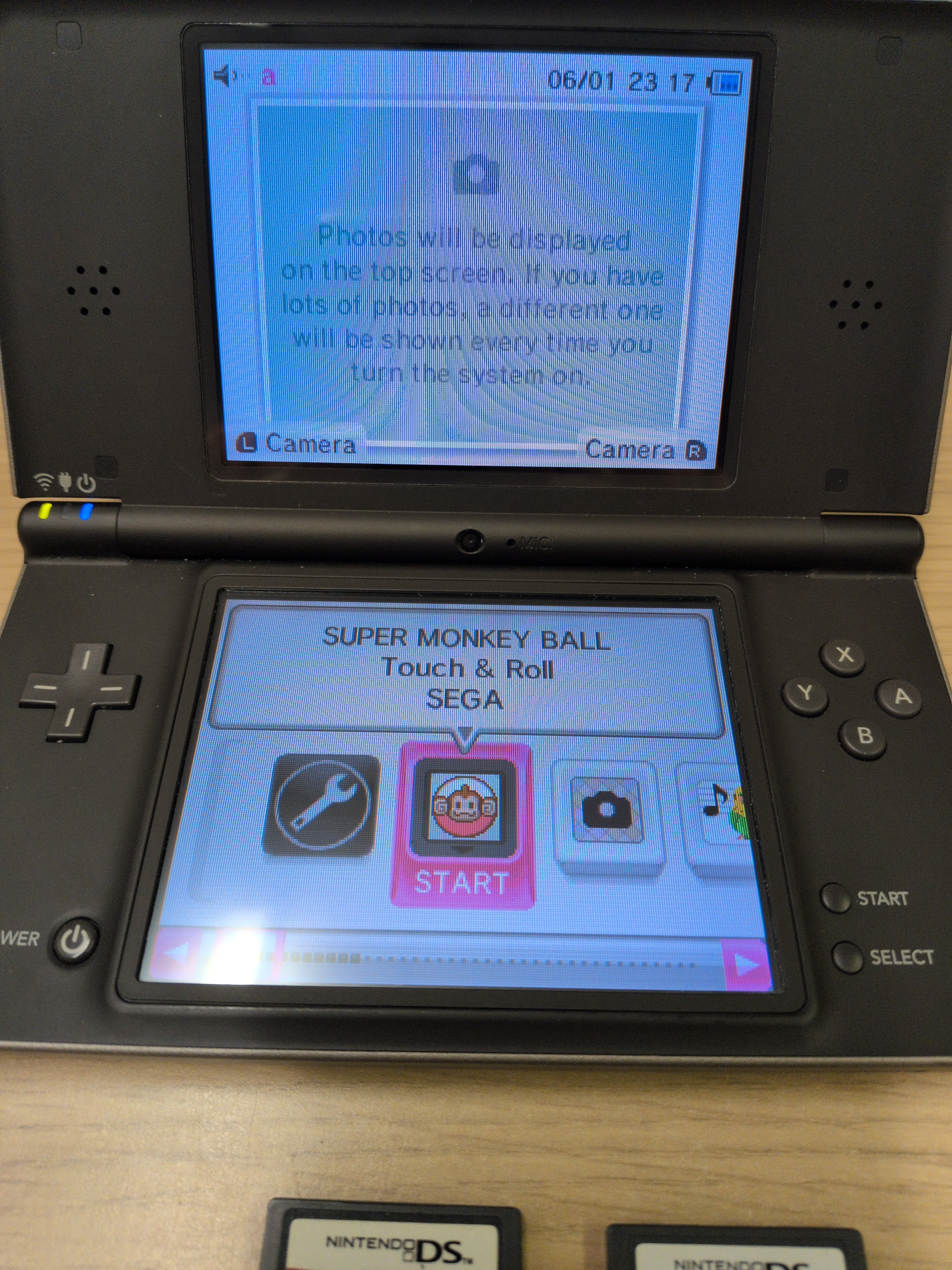Nintendo DSi XL Handheld Dark Brown & Games Bundle