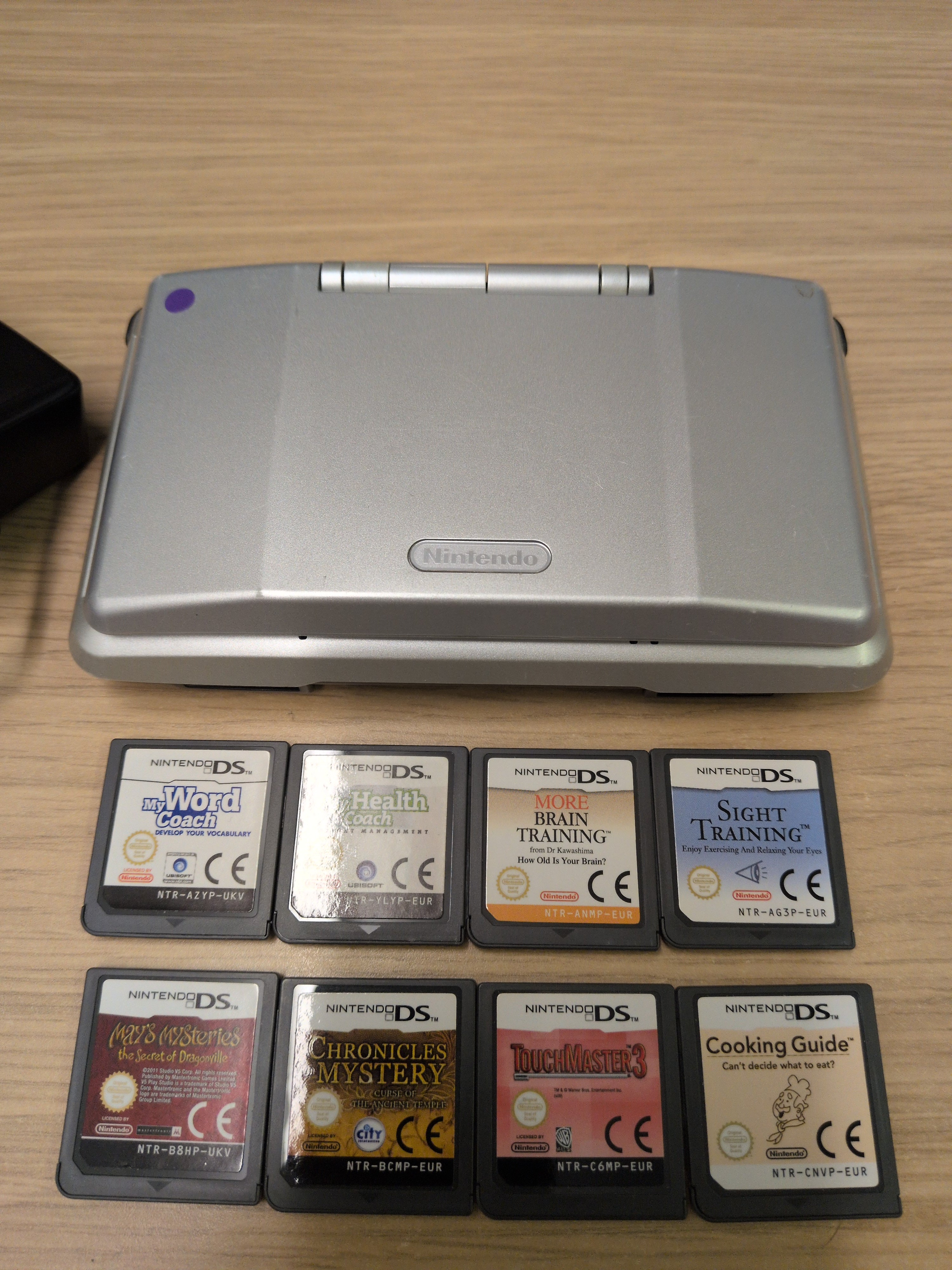 Nintendo DS Original handheld console bundle with 8 games