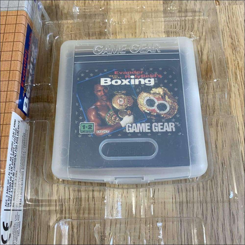 Buy Evander Holyfield's Real Deal Boxing Classic brown box -@ 8BitBeyond