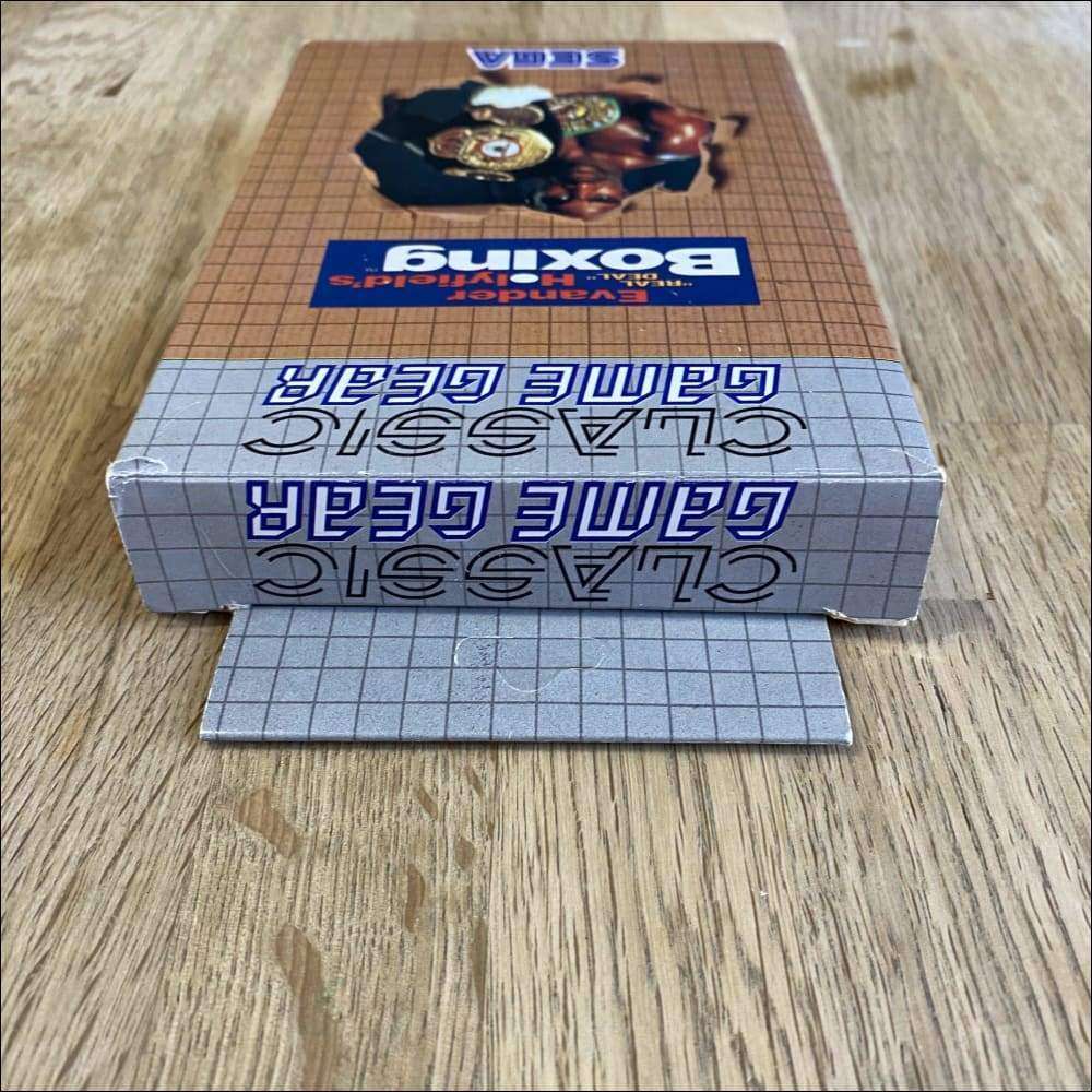 Buy Evander Holyfield's Real Deal Boxing Classic brown box -@ 8BitBeyond