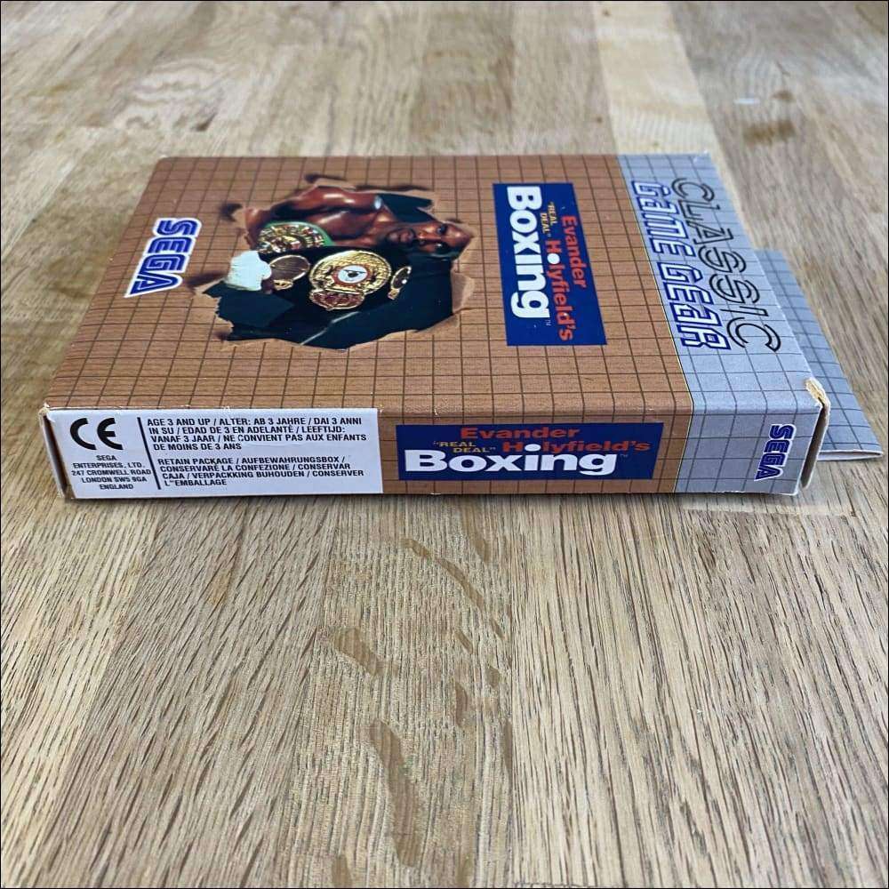Buy Evander Holyfield's Real Deal Boxing Classic brown box -@ 8BitBeyond