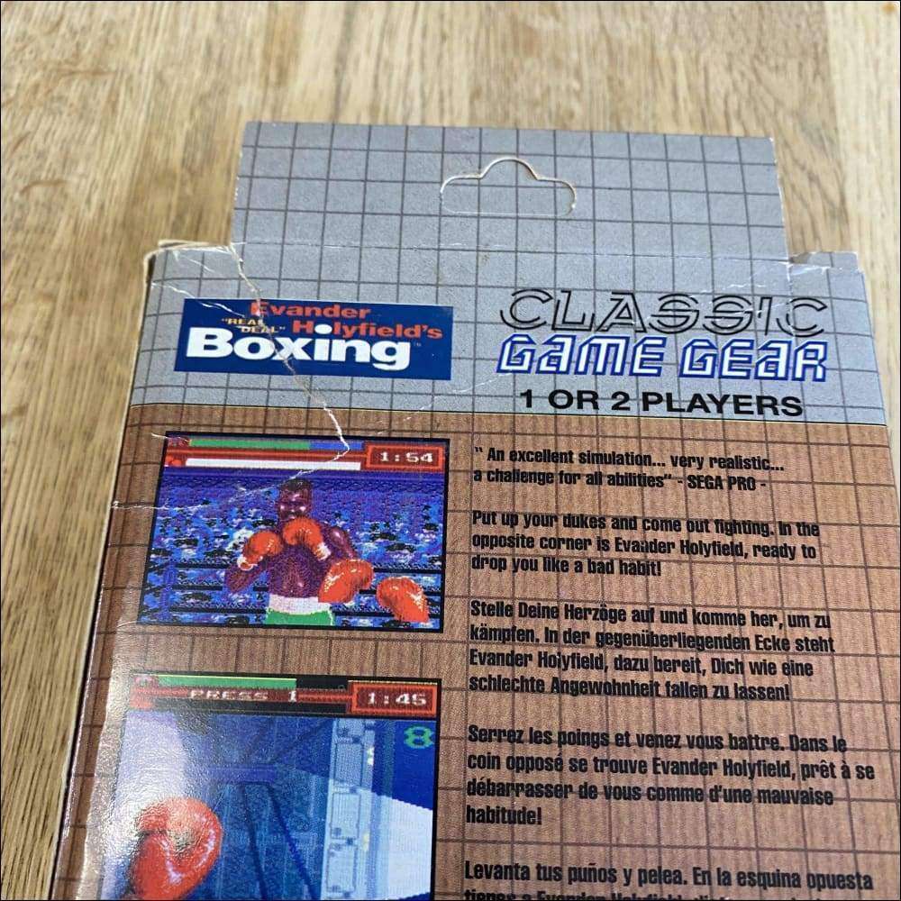 Buy Evander Holyfield's Real Deal Boxing Classic brown box -@ 8BitBeyond