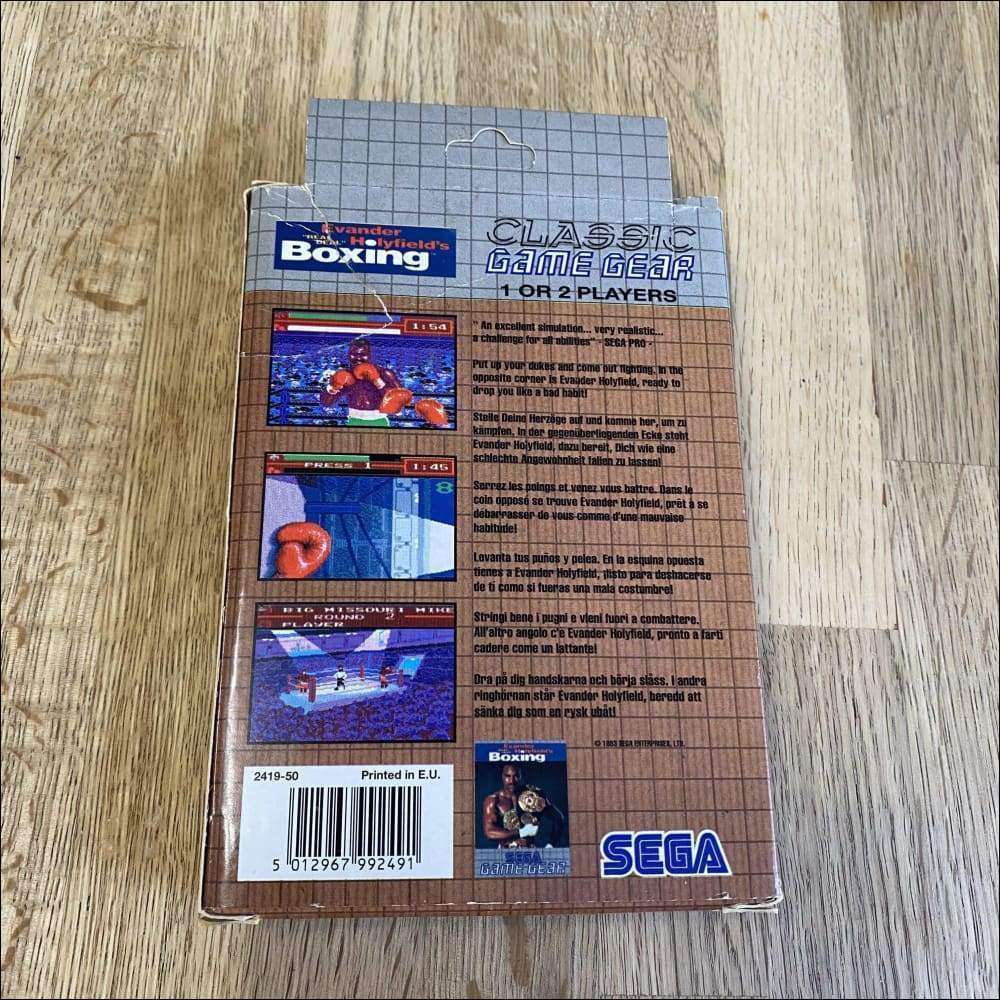 Buy Evander Holyfield's Real Deal Boxing Classic brown box -@ 8BitBeyond