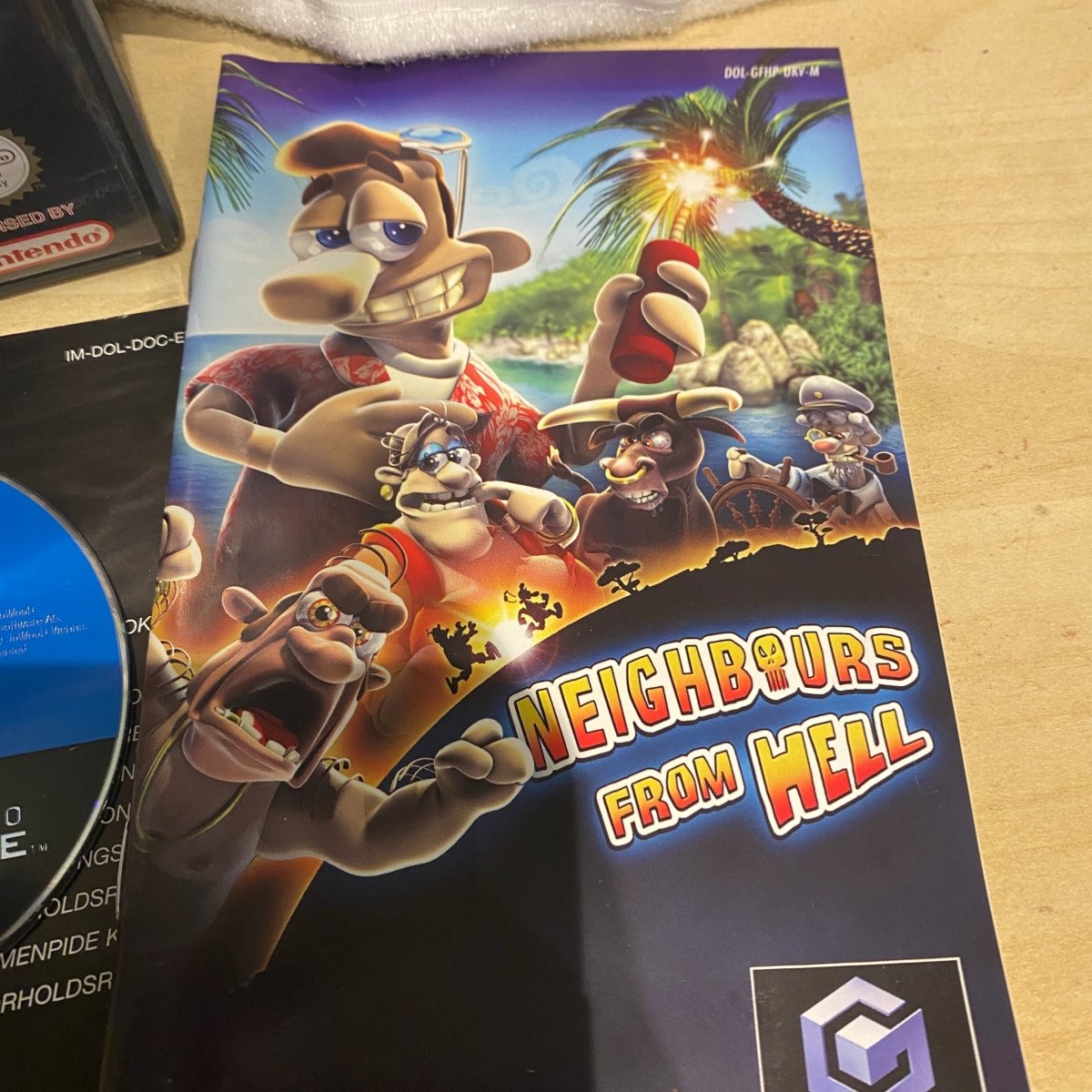 Buy Neighbours from Hell Gamecube game complete -@ 8BitBeyond