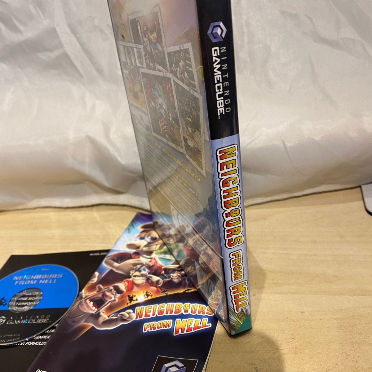 Buy Neighbours from Hell Gamecube game complete -@ 8BitBeyond