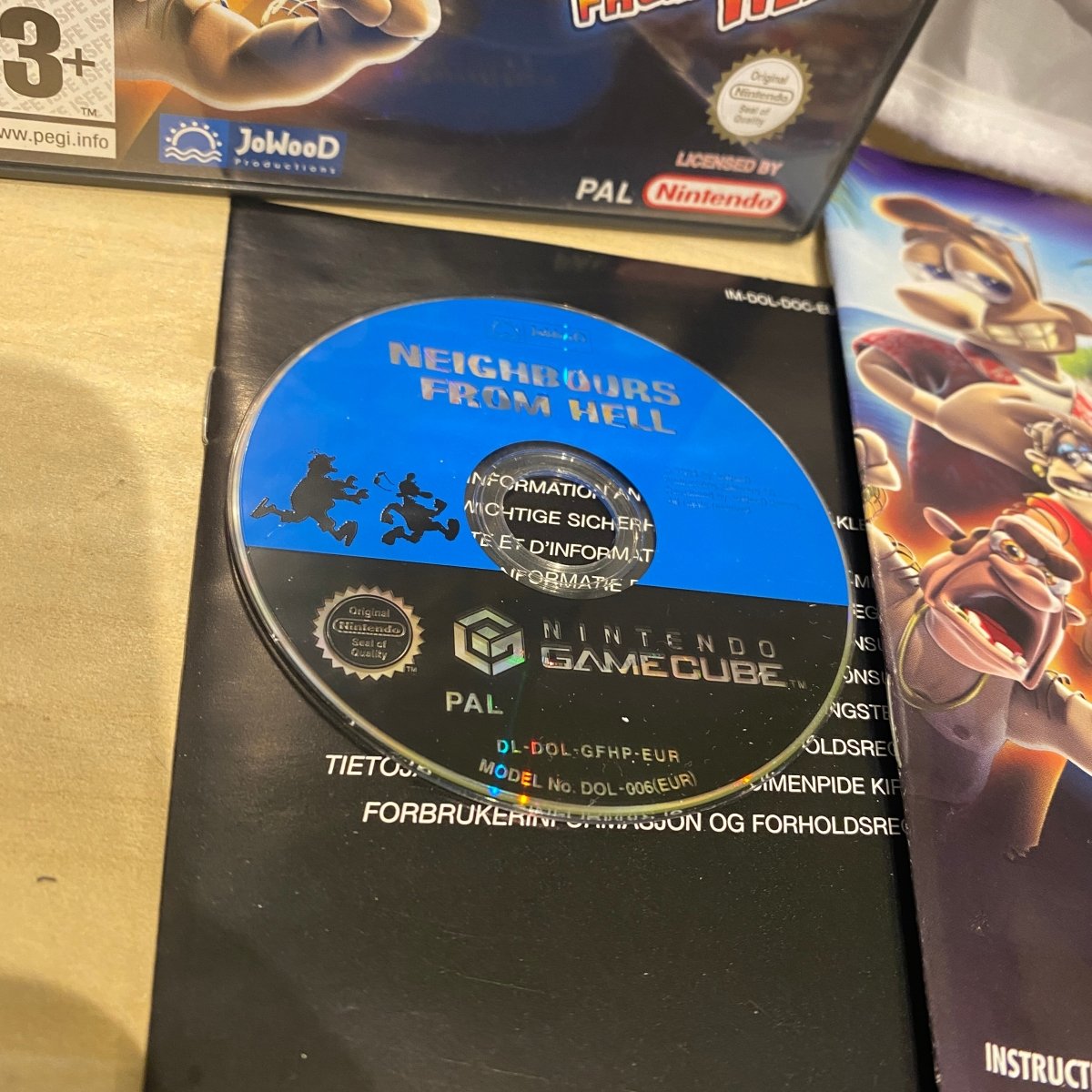 Buy Neighbours from Hell Gamecube game complete -@ 8BitBeyond