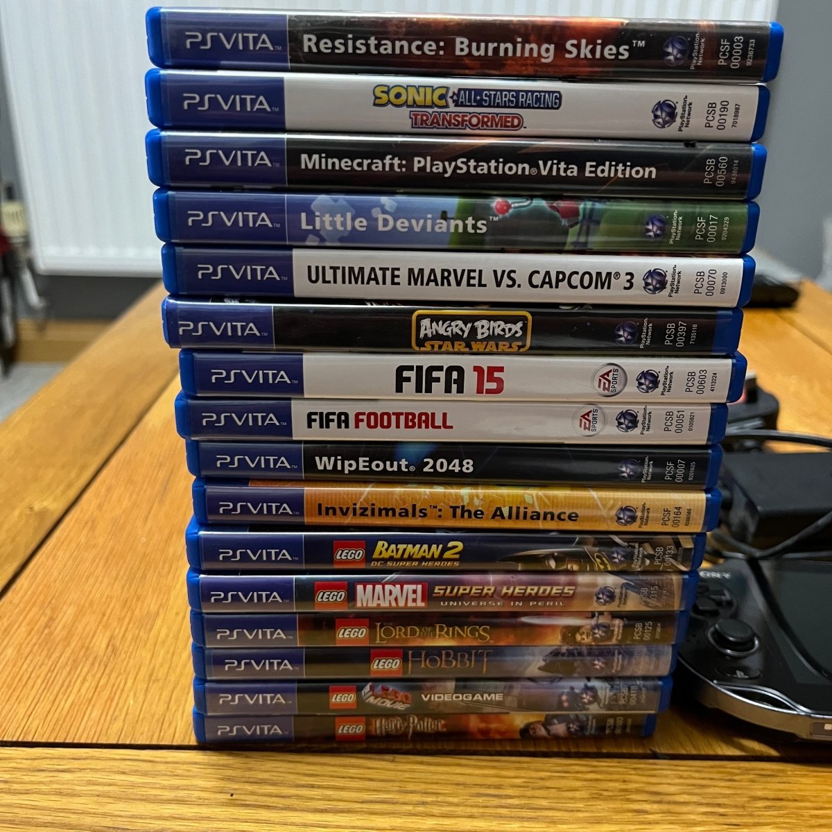Buy Ps vita console plus 16 games -@ 8BitBeyond