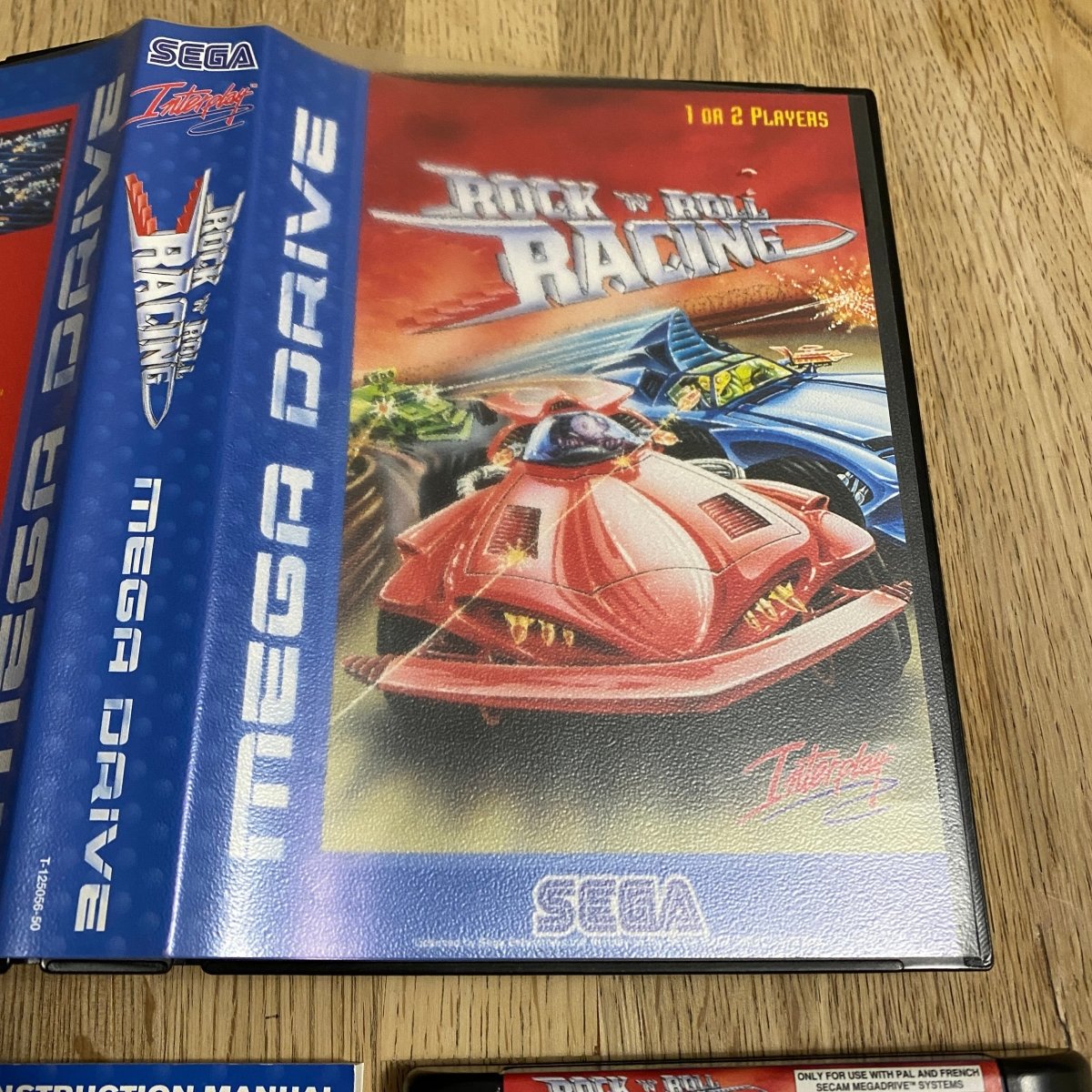 Buy Rock 'n Roll Racing Sega megadrive game complete -@ 8BitBeyond