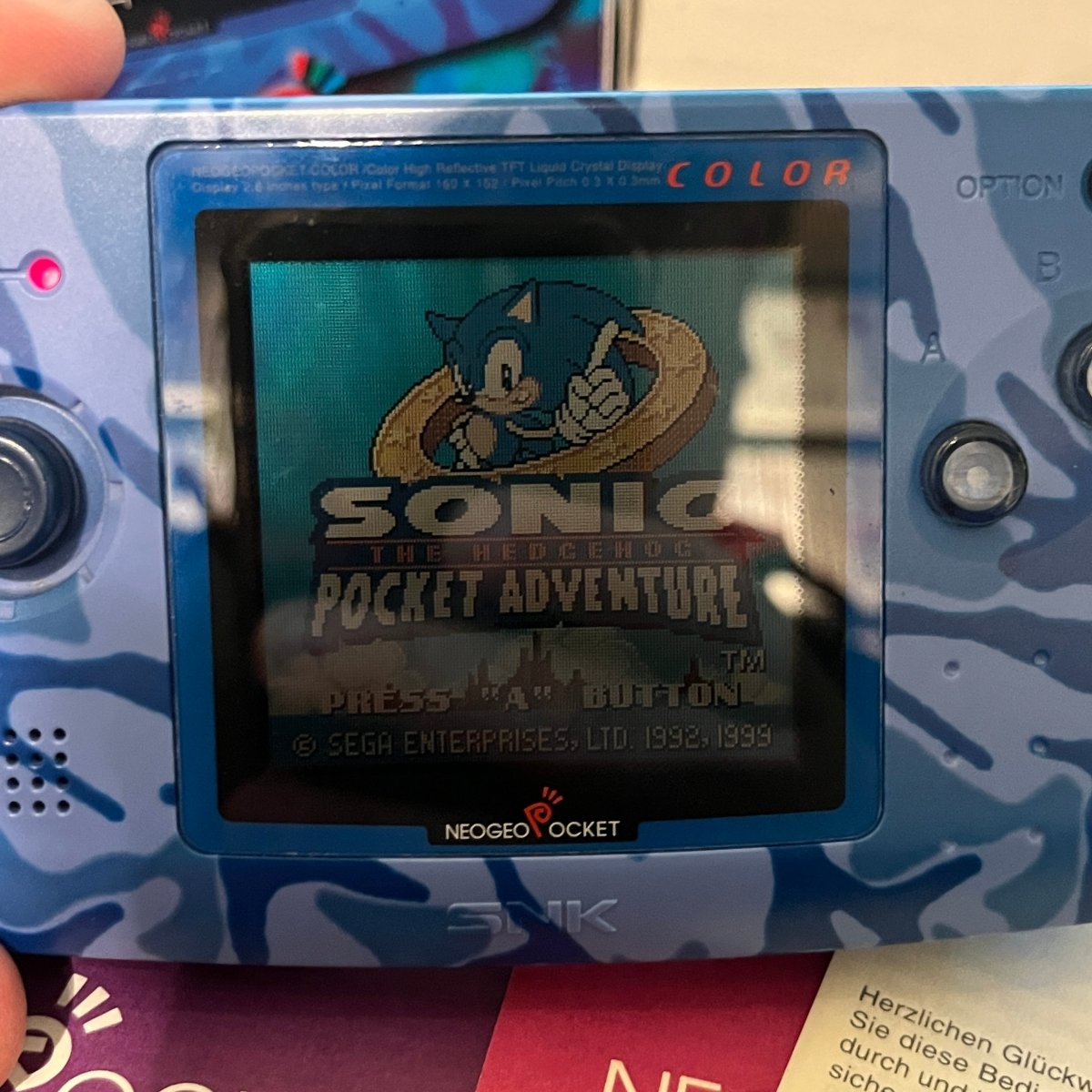 Console SNK Neo Geo Pocket Color Marble Blue d'occasion Console SNK Neo Geo Pocket Color Marble Blue d'occasion